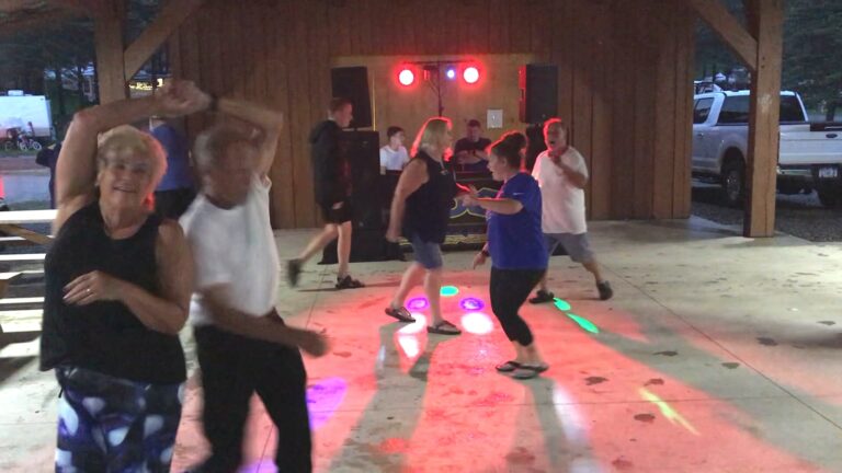 A group of people dancing at a western New York party.
