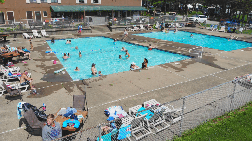 An aerial view of a swimming pool at Rainbow Lake resort.