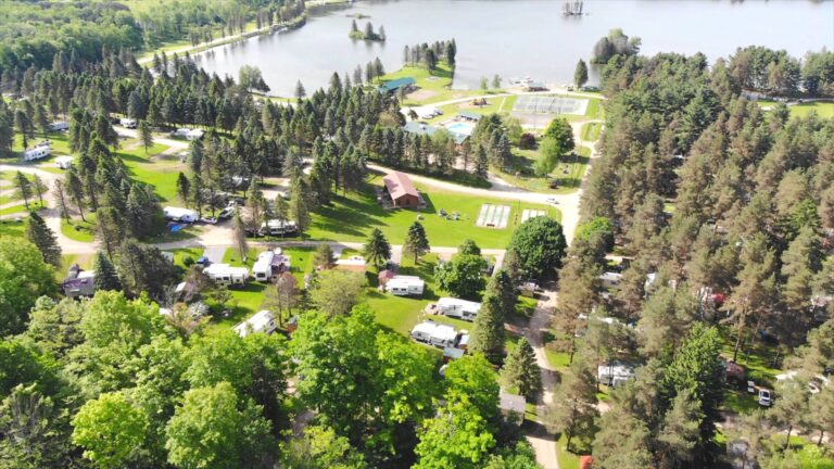 An aerial view of a family campground near a lake, perfect for camping enthusiasts in Western New York.