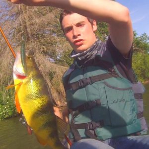 Fishing Holding Up Fish On Canoe 2023