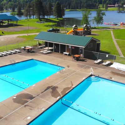 An aerial view of a swimming pool near Rainbow Lake in western New York.