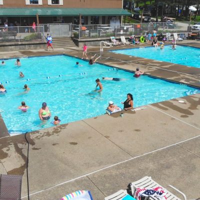 An aerial view of a swimming pool at a resort situated in western New York.