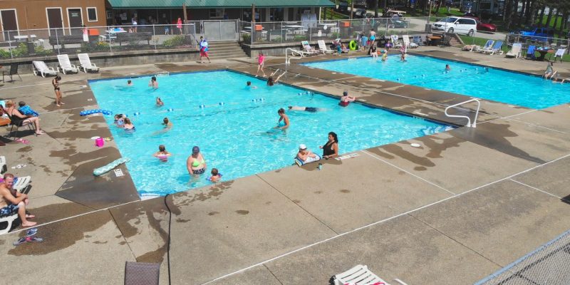 An aerial view of a swimming pool at a resort situated in western New York.