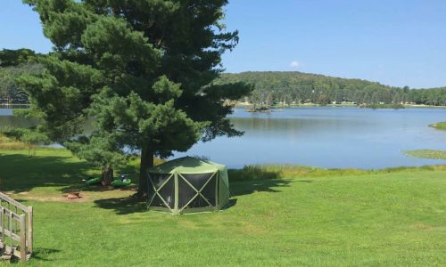A tepee on a grassy area near Rainbow Lake in western New York.